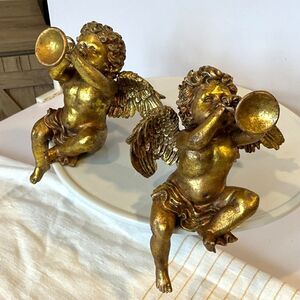 Set of two vintage gold chalkware angels with horns; shelf sitters must see
